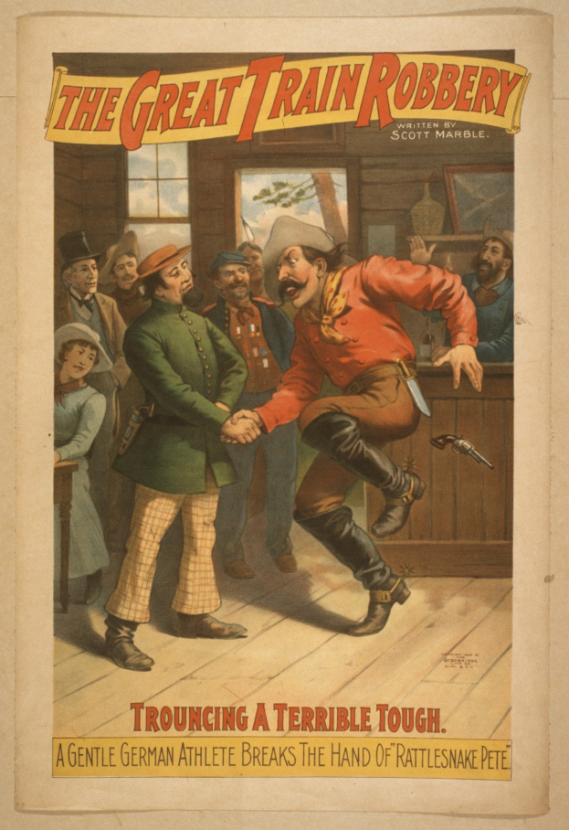 Plakat zeigt eine Gruppe von Menschen auf einem Boden mit einem, der eine Waffe hält, ein Fenster und eine Wand im Hintergrund und Text, der "Die große Zugüberfall - Trouching ein Schreckliches Tough" an der Ober- und Unterseite lautet.