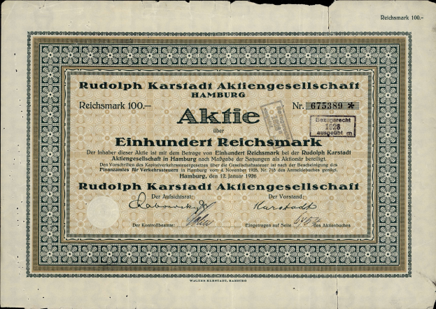 Ein alter deutscher Geldschein mit schwarzem Hintergrund und der Aufschrift "Rudolph Karlstadt Aktiengesellschaft Hamburg" darauf.