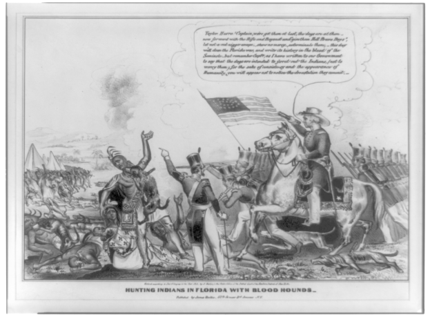 Schwarzes und weißes Foto einer Gruppe von Menschen, einige zu Pferde, mit einer Fahne im Hintergrund und Text unten mit der Aufschrift "Jagen von Indianern in Florida mit Bluthunden"