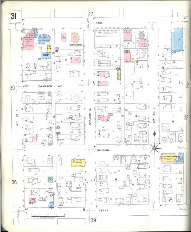Ein altes Buch mit einer Stadtkarte aus den 1920er Jahren, die Straßen, Parks und Sehenswürdigkeiten zeigt.