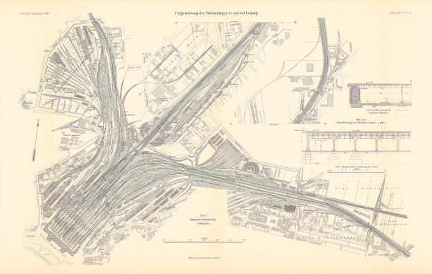 Ein detaillierter alter Stadtplan, der Straßen, Gebäude und Text mit Straßennamen, Parks und Sehenswürdigkeiten zeigt.